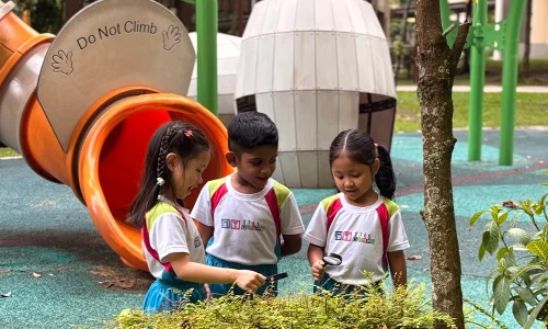 three-kids-playground-magnify-glass